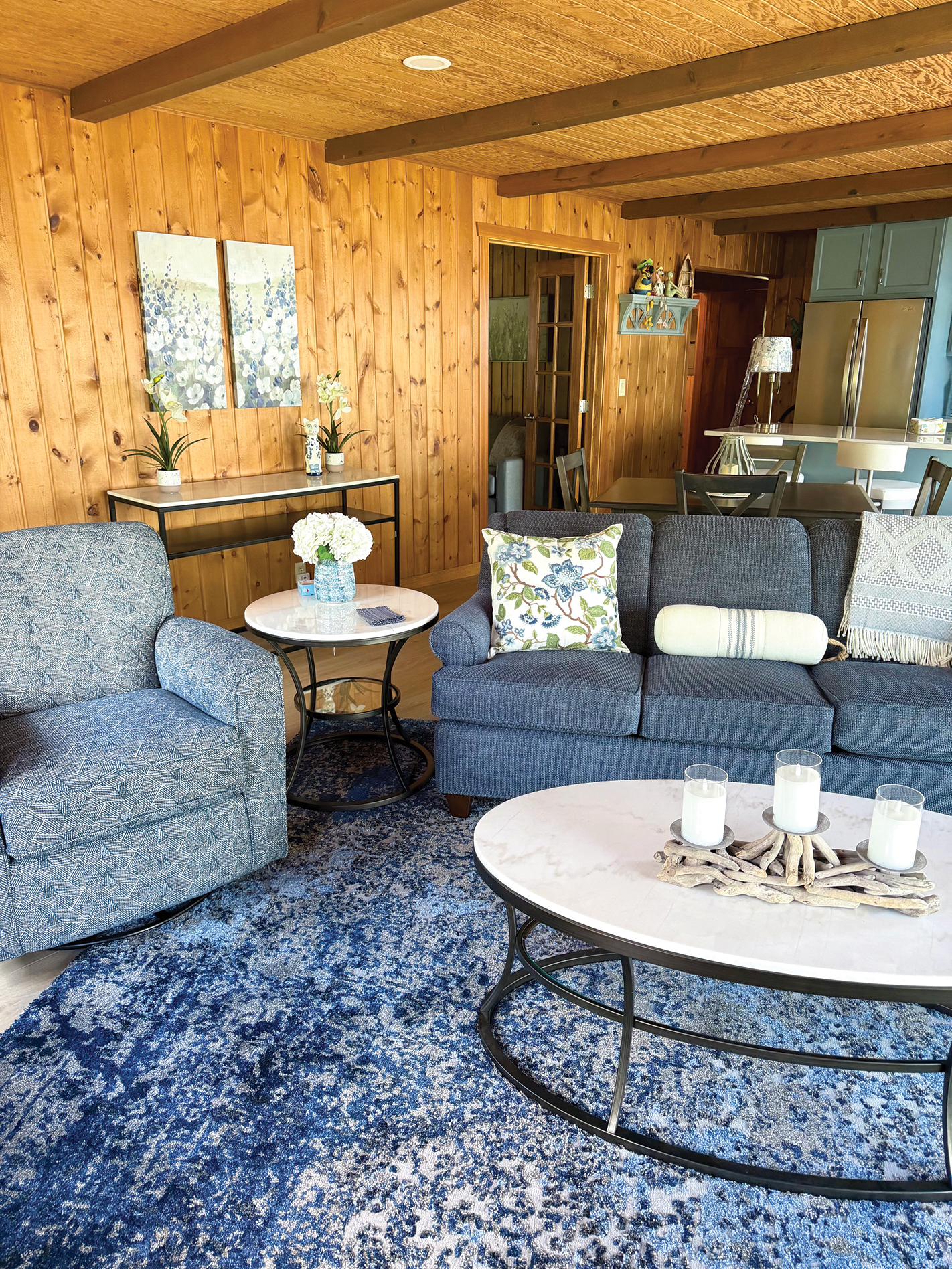 Lake cottage living room with wood-paneled walls