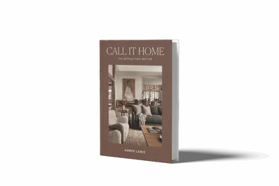 Copy of the book Call It Home by Amber Lewis standing upright against a white background