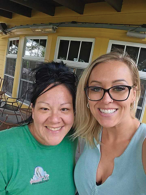 Veronica McCloud with a TLC Cleaning colleague