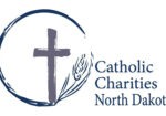 Catholic Charities North Dakota logo with a cross and wheat stem
