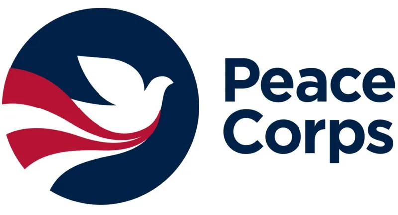 Peace Corps logo with white dove and red swoosh on navy circle