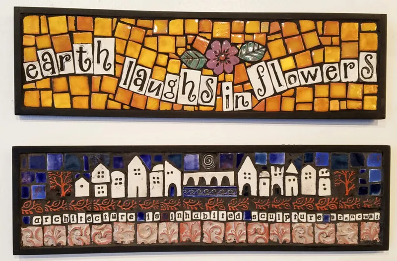 Two rectangular mosaic artworks with quotes about earth and architecture