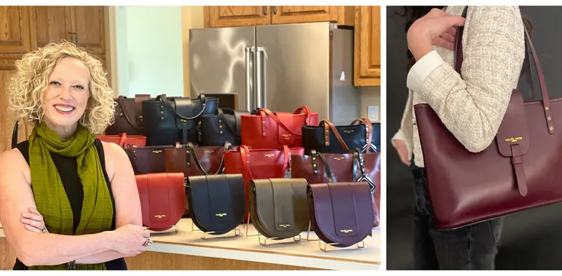 Curly-haired woman posing with a display of leather handbags; close-up of a burgundy leather tote bag