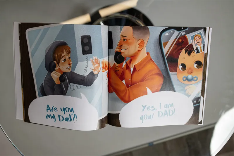 Open children's book spread showing illustrated child and man on phones with speech bubbles reading "Are you my Dad?!" and