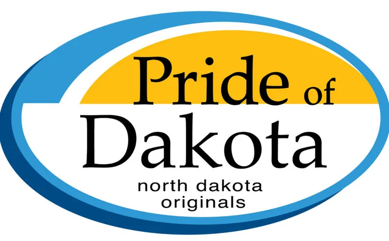Pride of Dakota – North Dakota Originals oval logo in blue, gold, and white