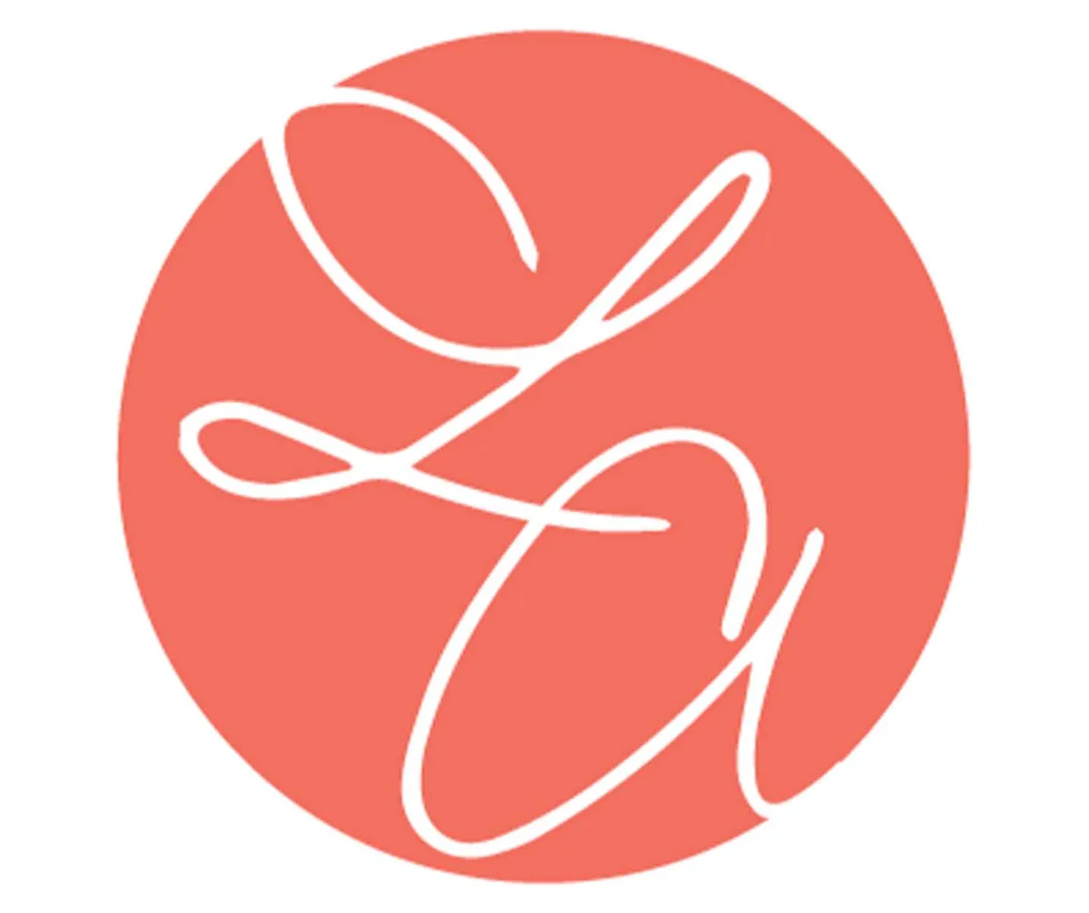 Coral circle logo with overlapping white cursive script letters