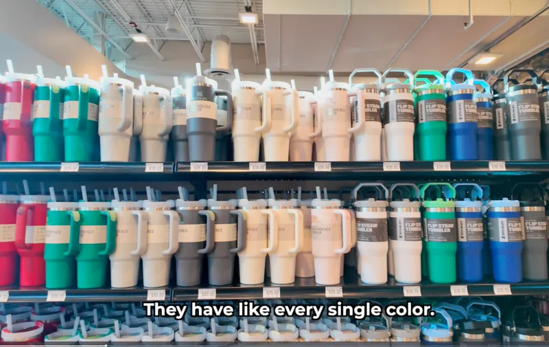shelves of stanley tumblers at scheels
