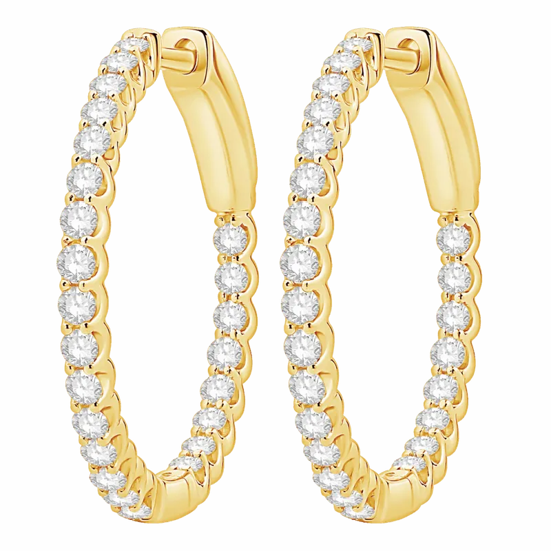 Pair of yellow gold hoop earrings set with round white stones