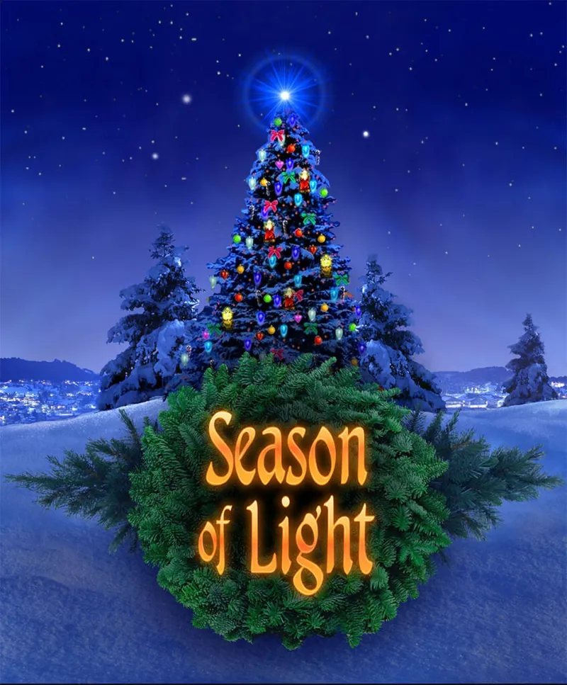 Decorated outdoor Christmas tree with colorful lights beneath a starry night sky and "Season of Light" text on a wreath