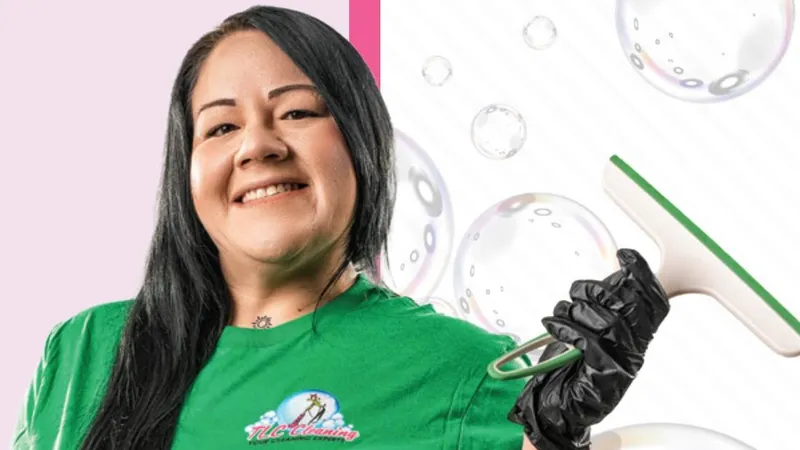 Veronica McCloud of TLC Cleaning holding cleaning supplies