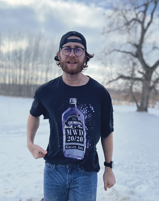Person wearing a Kalohe Designs printed T-shirt