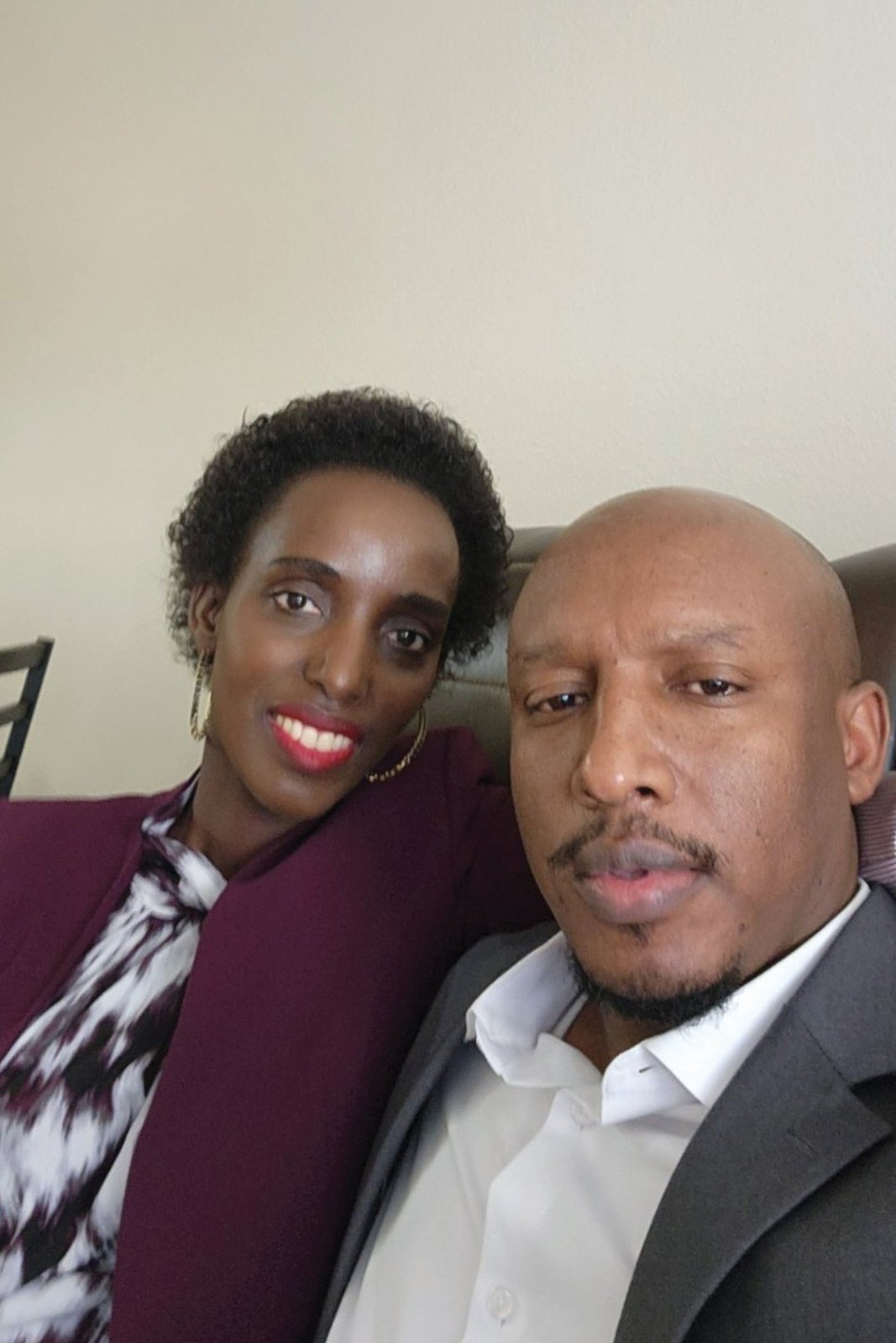 John Pierre Shukuru and Nyambibi Bibi Jolie smiling together in a selfie