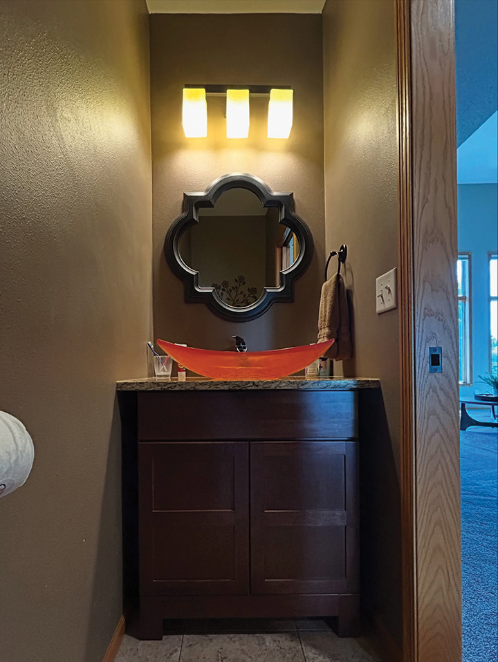 Powder room vanity before renovation