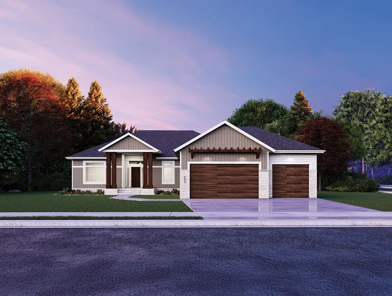 Single-story craftsman-style home with wood garage doors and stone accents at dusk
