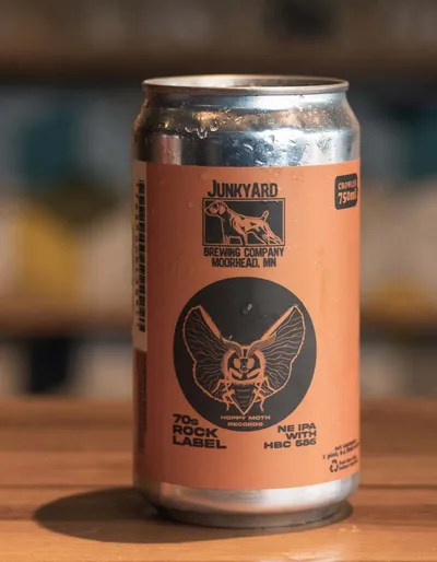 Junkyard Brewing Company NE IPA can with moth graphic on an orange label