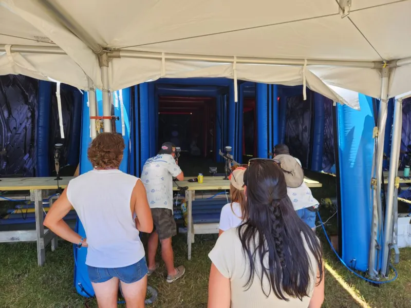 People playing alien paintball at WE Fest