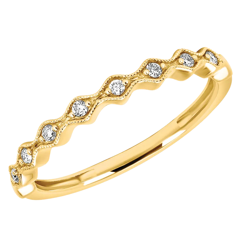 Yellow gold stackable band with scalloped edges and small round diamonds