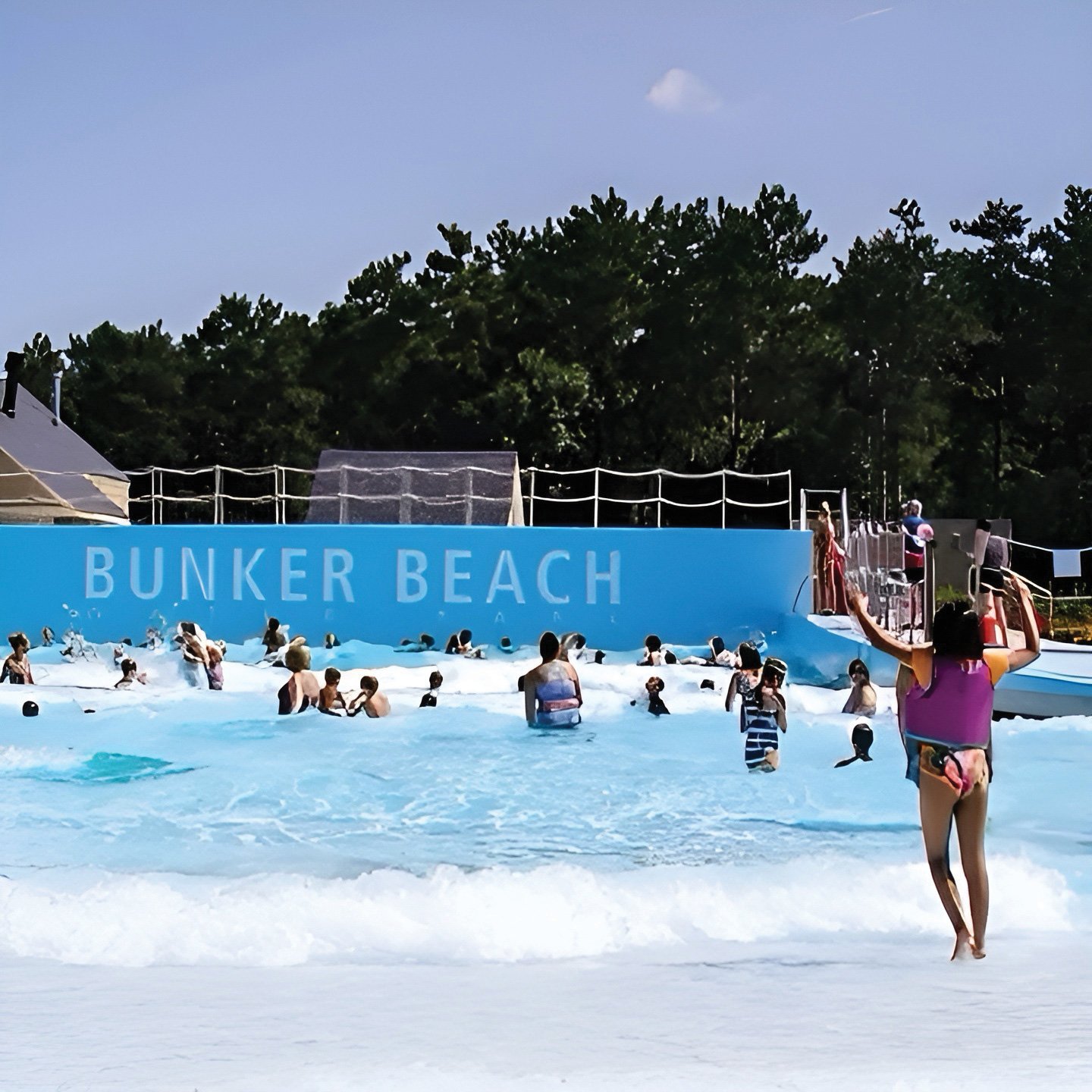 Kids splash in the wave pool at Bunker Beach Water Park