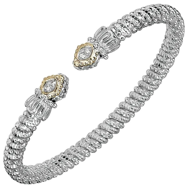 Open-cuff silver bracelet with textured beaded band and gold-framed crystal cluster ends
