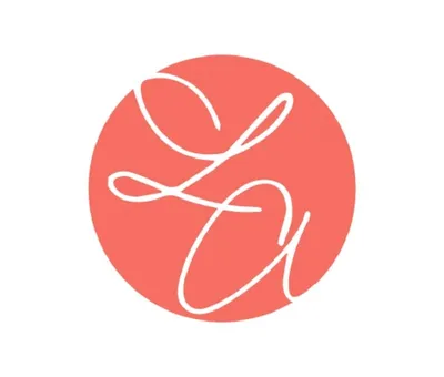 Coral circle logo with white cursive script initials