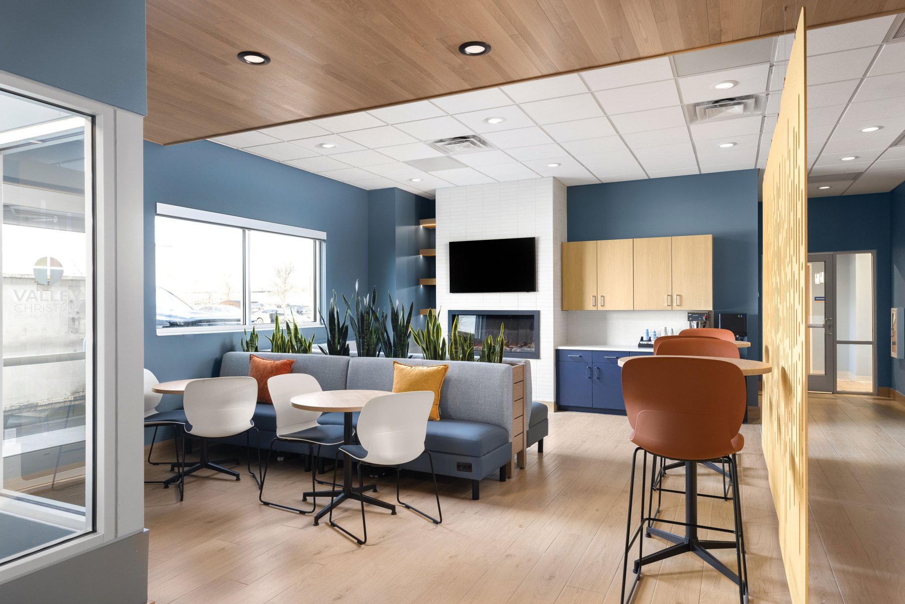 A bright, comfortable lounge area with seating inside the Hulbert Children's Center