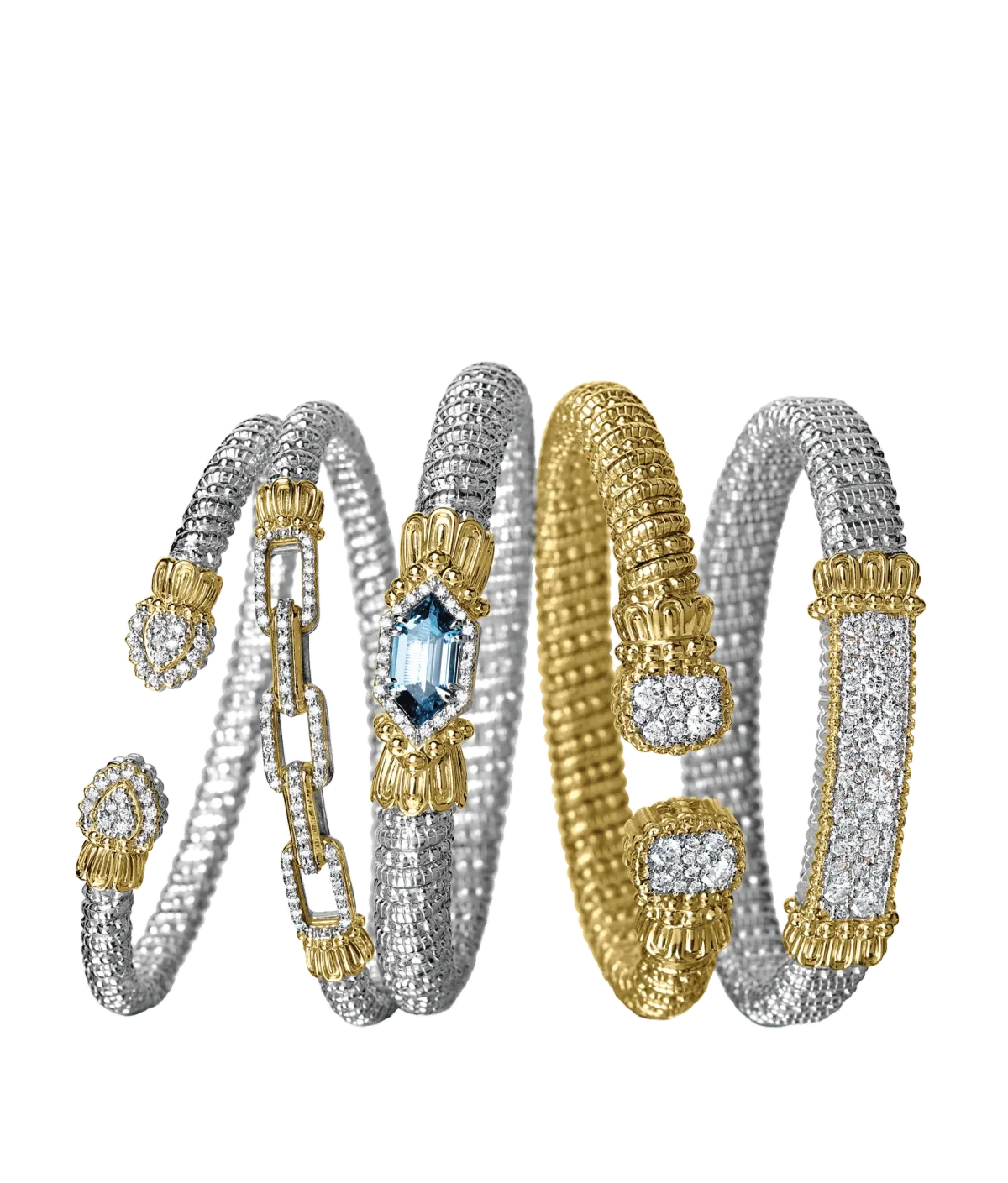 Four silver and gold textured cuff bracelets with diamonds and a blue gemstone centerpiece
