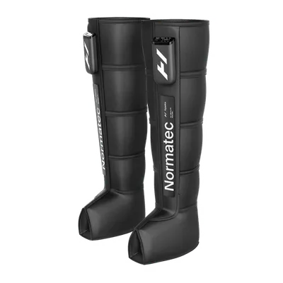 Pair of black Normatec leg compression sleeves with segmented panels