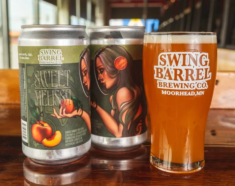 Two Sweet Melissa beer cans and a full pint glass from Swing Barrel Brewing Co., Moorhead MN