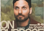 Man with beard and short dark hair beside text reading Jay Shetty On Purpose podcast logo