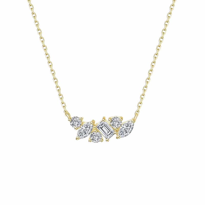 Yellow gold chain necklace with a cluster of mixed-cut white stones