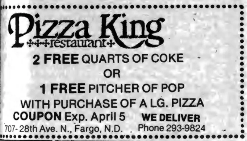 Black-and-white print coupon for Pizza King Restaurant in Fargo, ND offering free drinks with large pizza purchase