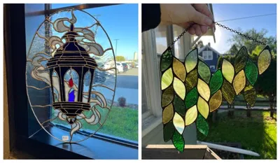 Two stained glass suncatchers: a lantern design and a cluster of green leaves held up to a window