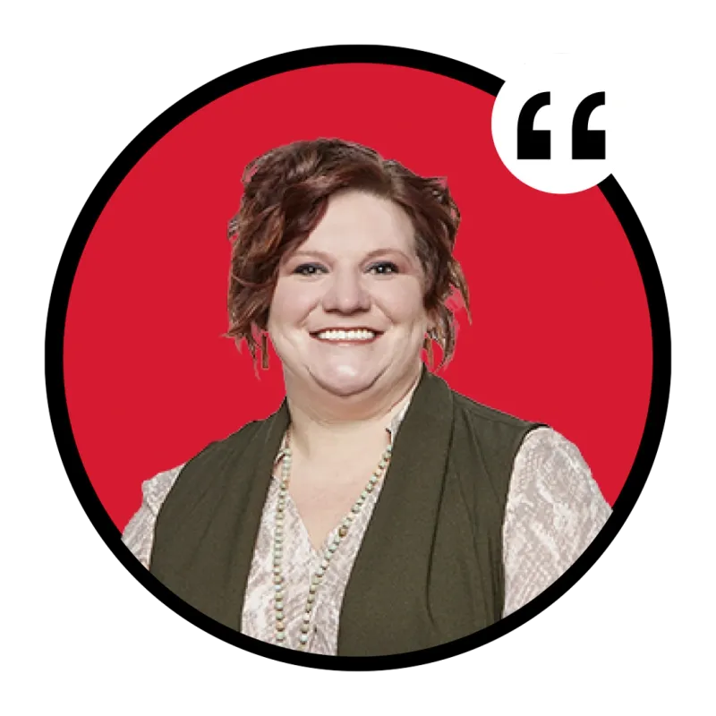 Smiling woman with short auburn hair wearing a green vest and beaded necklace against a red circle background with a quote