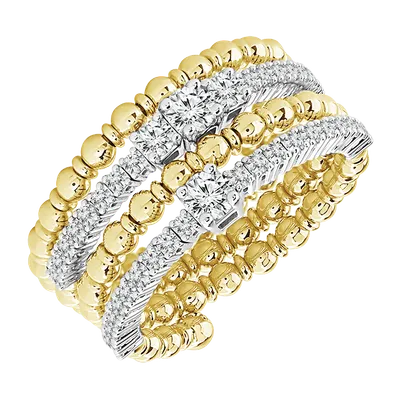 Stacked gold and diamond rings with beaded and pavé bands
