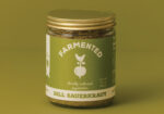 Glass jar of dill sauerkraut with a green label reading 'Farmented
