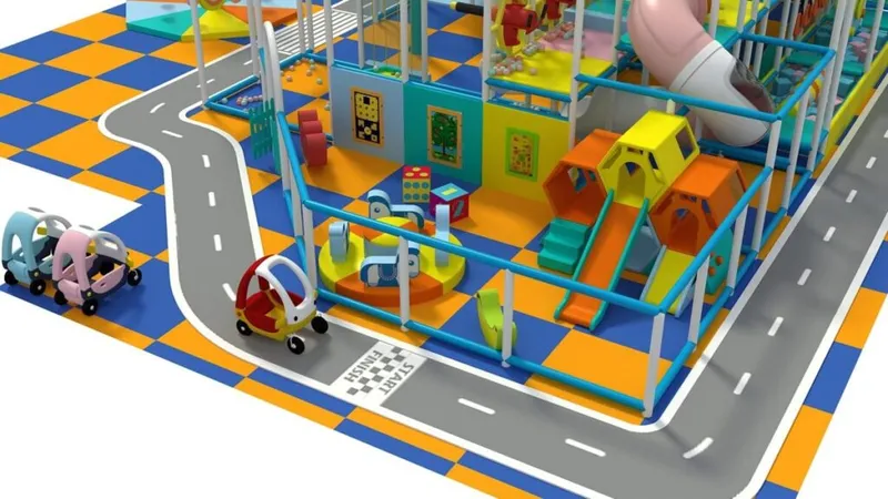 3D rendering of a colorful indoor children's play center with slides, toy cars, and a go-kart track
